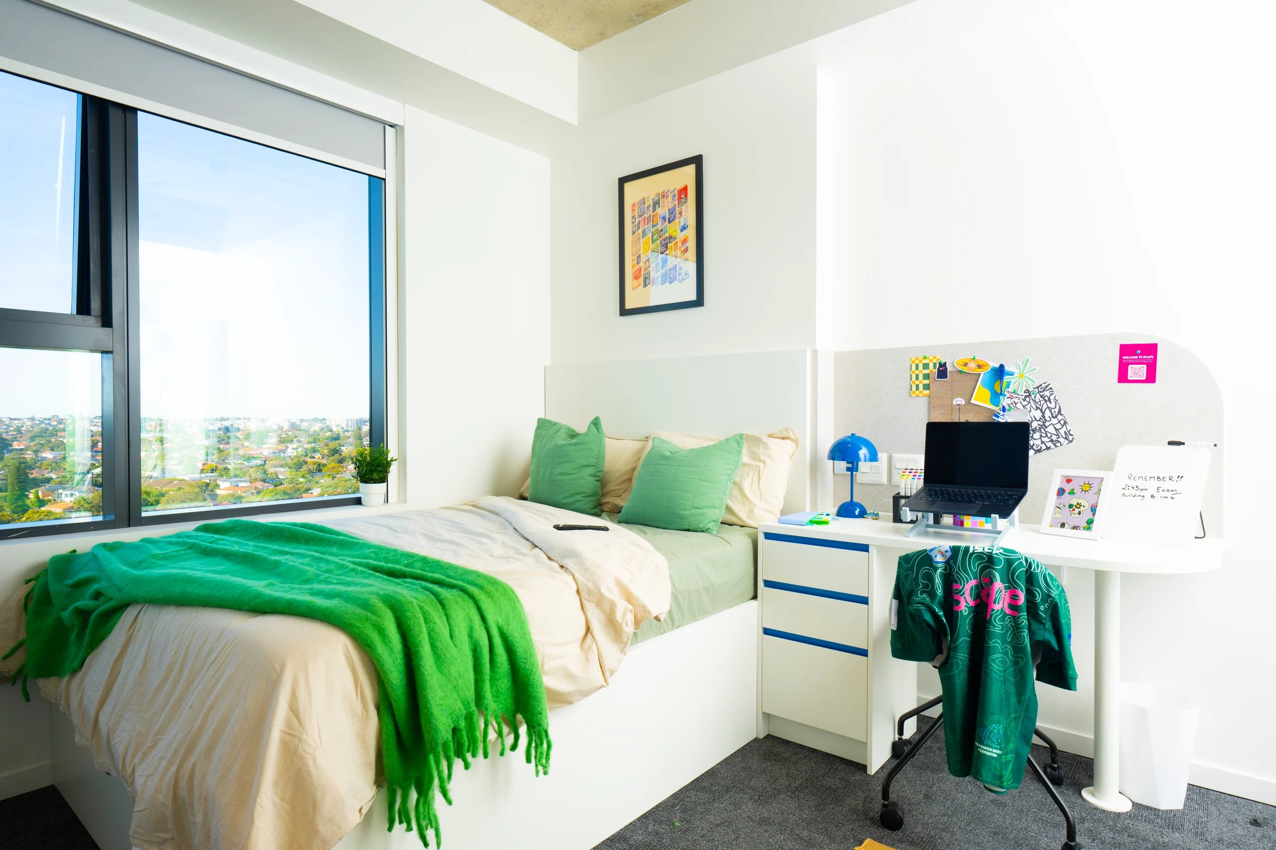 Bed desk laptop and artwork bedroom at Scape Kingsford in Sydney Student Accommodation