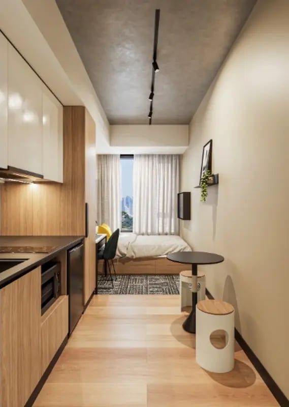 Kitchen bed desk table and chairs studio at EPIISOD Macquarie Park in Sydney Student Accommodation