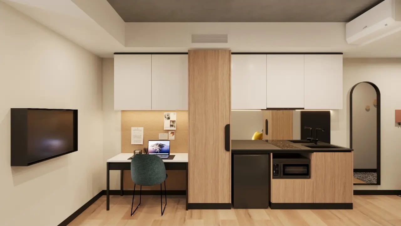 Desk TV chair kitchen and mirror study area at EPIISOD Macquarie Park in Sydney Student Accommodation