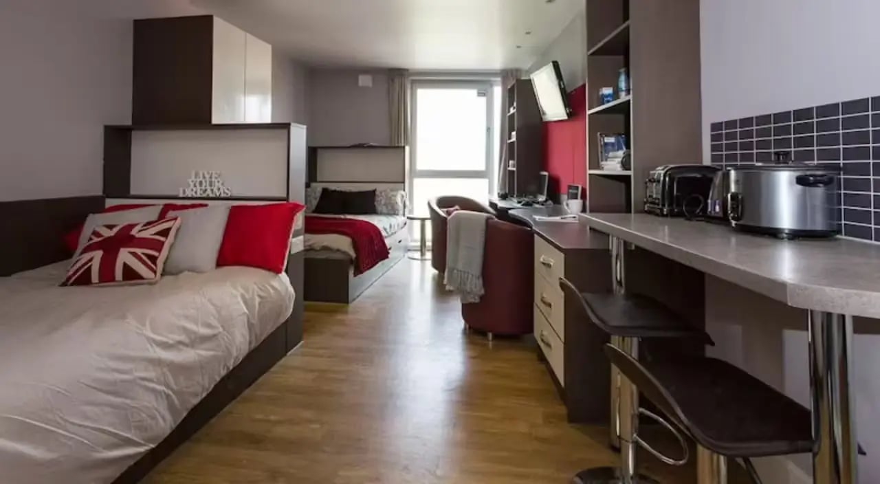 Beds desks chairs kitchen appliances student studio at Camden Hawley Crescent in London Student Accommodation