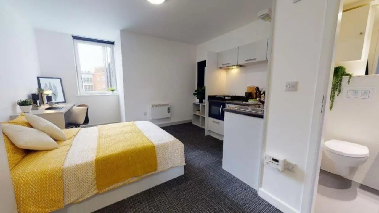 Bed desk kitchen and bathroom student studio at iQ Newland House in Nottingham Student Accommodation