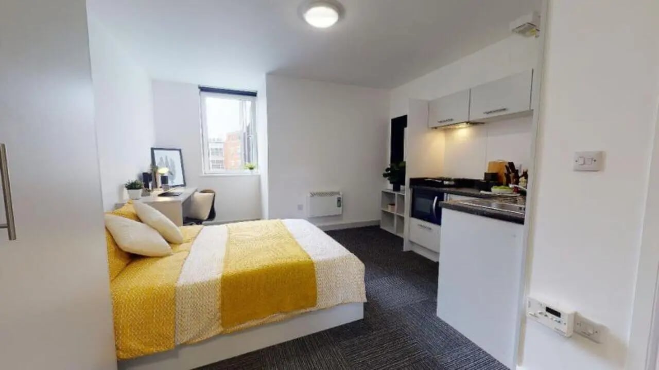 Bed desk kitchen area with appliances studio at iQ Newland House in Nottingham Student Accommodation
