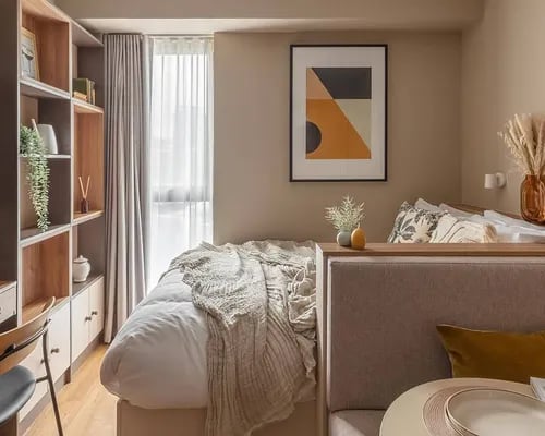 Bed with shelves and art bedroom at ARK Wembley in London Student Accommodation