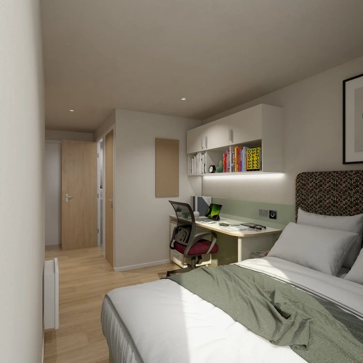 Desk chair laptop bookshelves bed and door bedroom at Broadcasting Tower in Leeds Student Accommodation