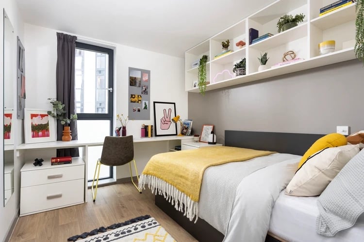 Bed desk and shelves study bedroom at Parkway Gate in Manchester Student Accommodation