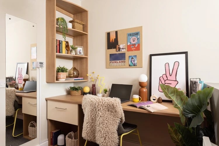 Desk with laptop and chair study area at Chalmers Street in Edinburgh Student Accommodation
