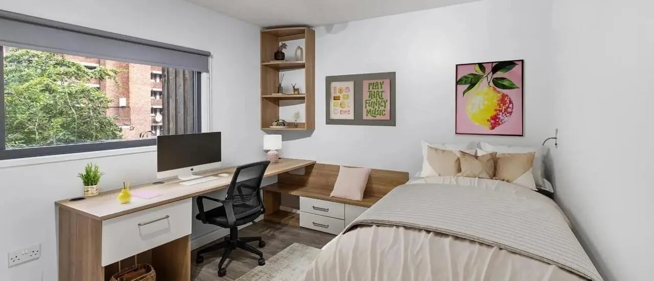 Desk bed shelf with art Bedroom at Chapter Highbury in London Student Accommodation