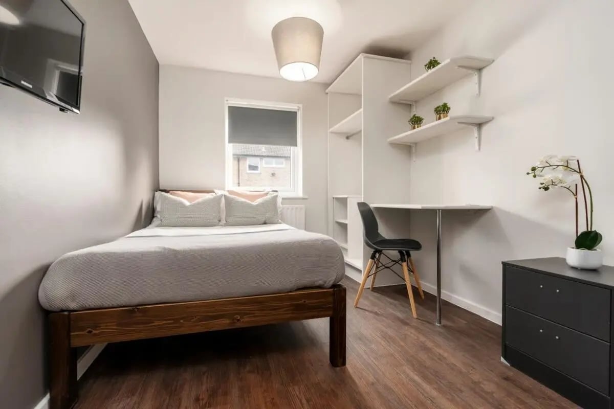 Bed desk wardrobe shelving and dresser bedroom at 28 Church Street in Nottingham Student Accommodation