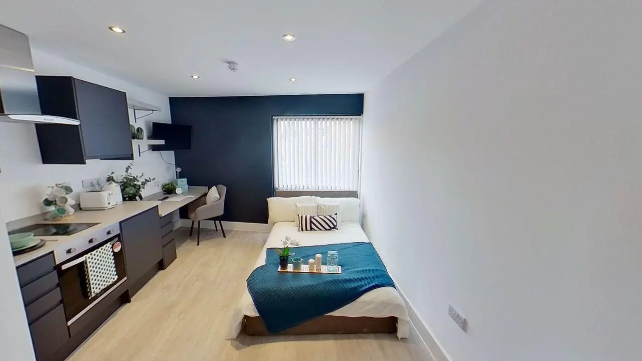 Bed desk kitchen and appliances studio apartment at Dojo House Nottingham in Nottingham Student Accommodation