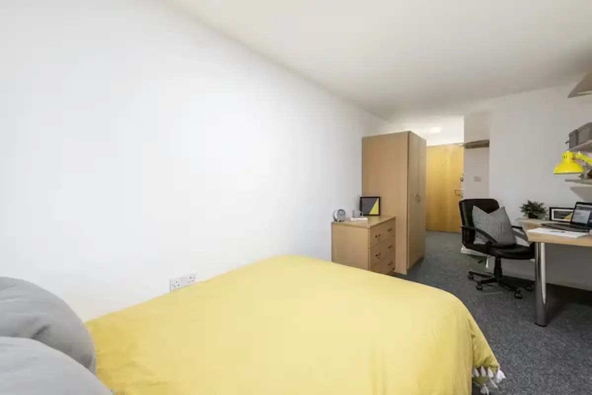 Bed dresser wardrobe desk chair lamp bedroom at Central Place in Sheffield Student Accommodation