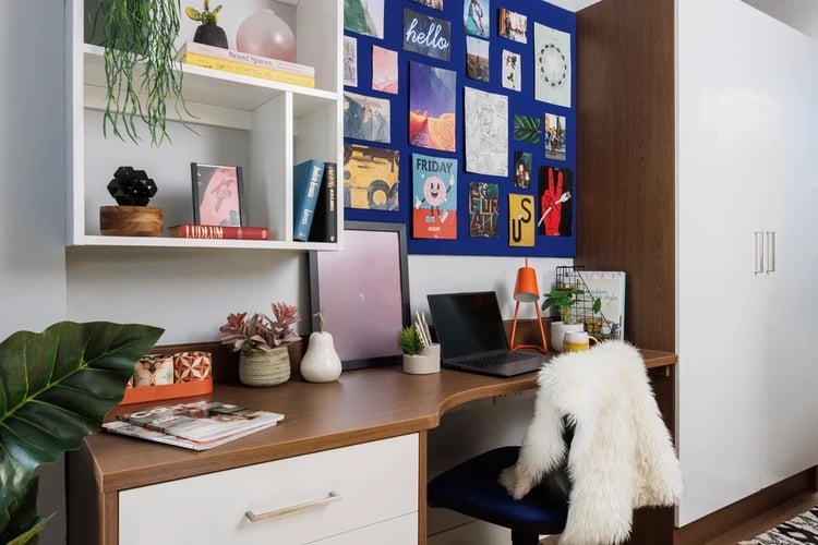 Desk with laptop and collages study area at Sugarhouse in Edinburgh Student Accommodation