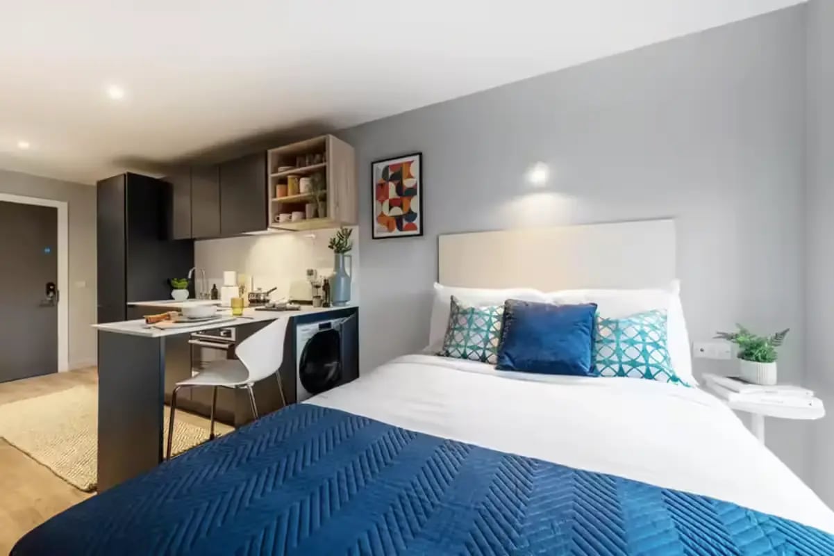 Bed kitchen washer and artwork studio apartment at The Aspen in Leicester Student Accommodation