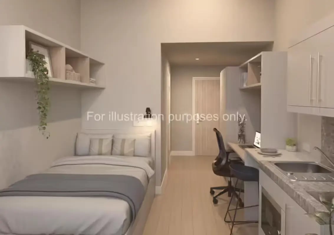 Bed desk kitchen area and shelves studio apartment at Glasgow Citi View in Glasgow Student Accommodation