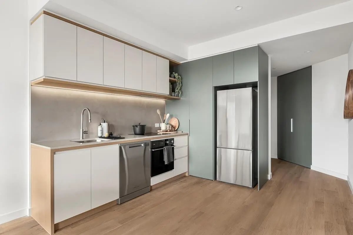 Modern kitchen with stainless steel appliances and ample cabinetry kitchen at Caulfield Place in Melbourne Student Accommodation