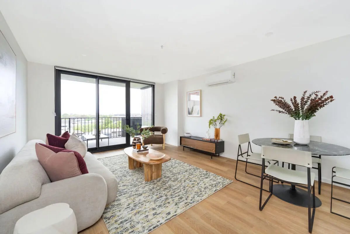Sofa coffee table dining set living room at Dickson Village Apartments in Canberra Student Accommodation