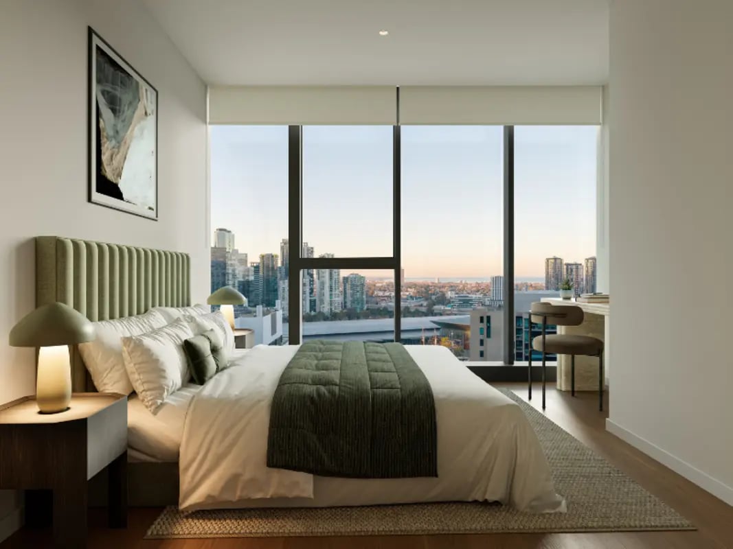 Bed bedside table lamps art painting bedroom at West Tower, Melbourne Quarter in Melbourne Student Accommodation