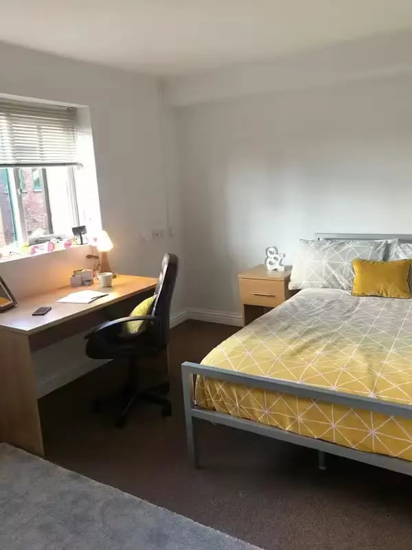 Desk chair bedside table bed bedroom at Solly House - Central Place in Sheffield Student Accommodation