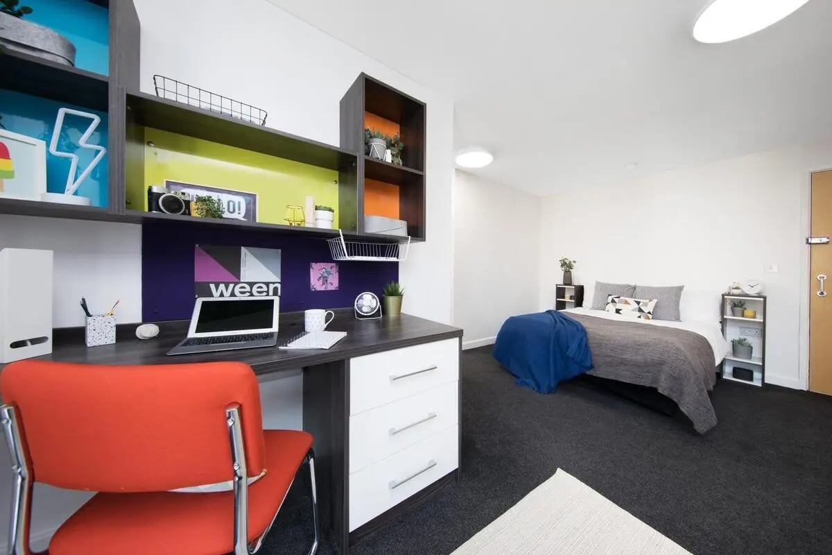 Desk laptop chair bed shelves bedroom at Prospect Point in Liverpool Student Accommodation