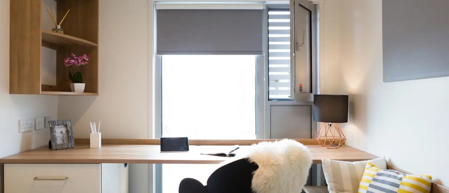 Desk with tablet lamp and chair Study area at Chapter South Bank in London Student Accommodation