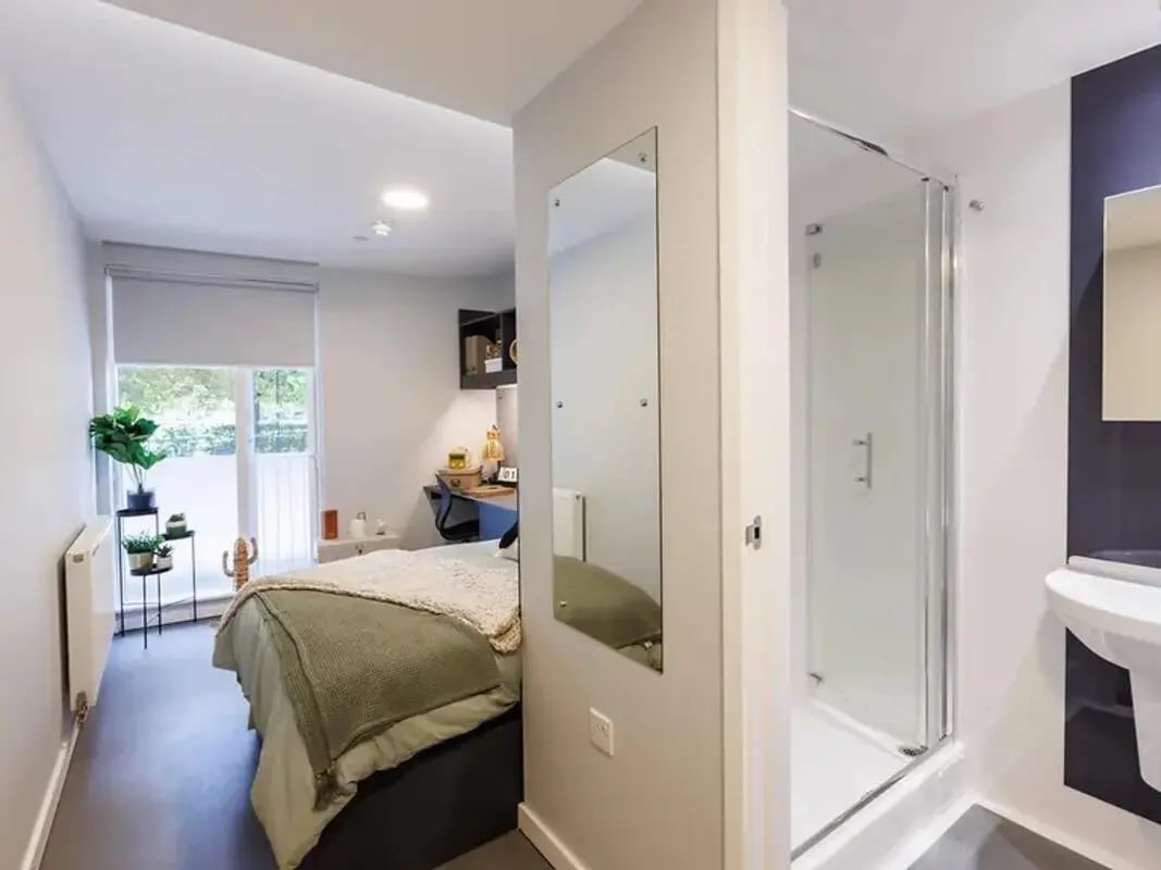 Bed desk mirror shower sink ensuite bathroom at Element Bermondsey in London Student Accommodation