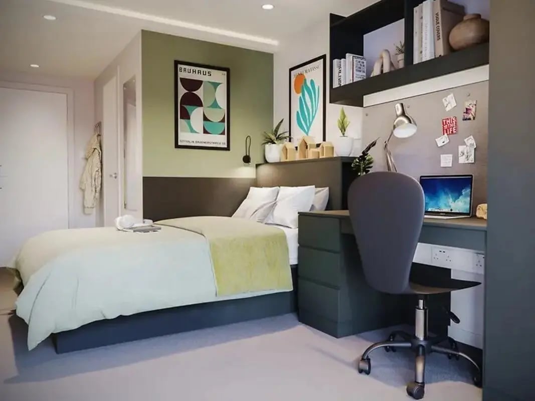 Bed desk chair laptop and artwork bedroom at Element Bermondsey in London Student Accommodation