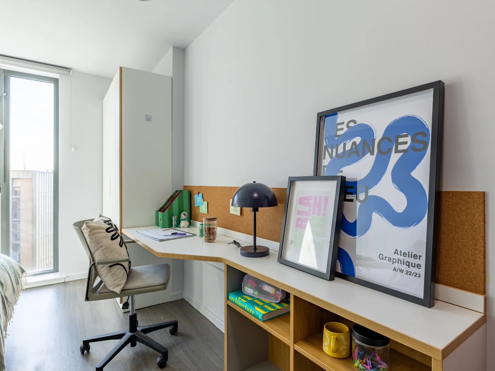 Desk with chair lamp and artwork study area at Dunaskin Mill in Glasgow Student Accommodation