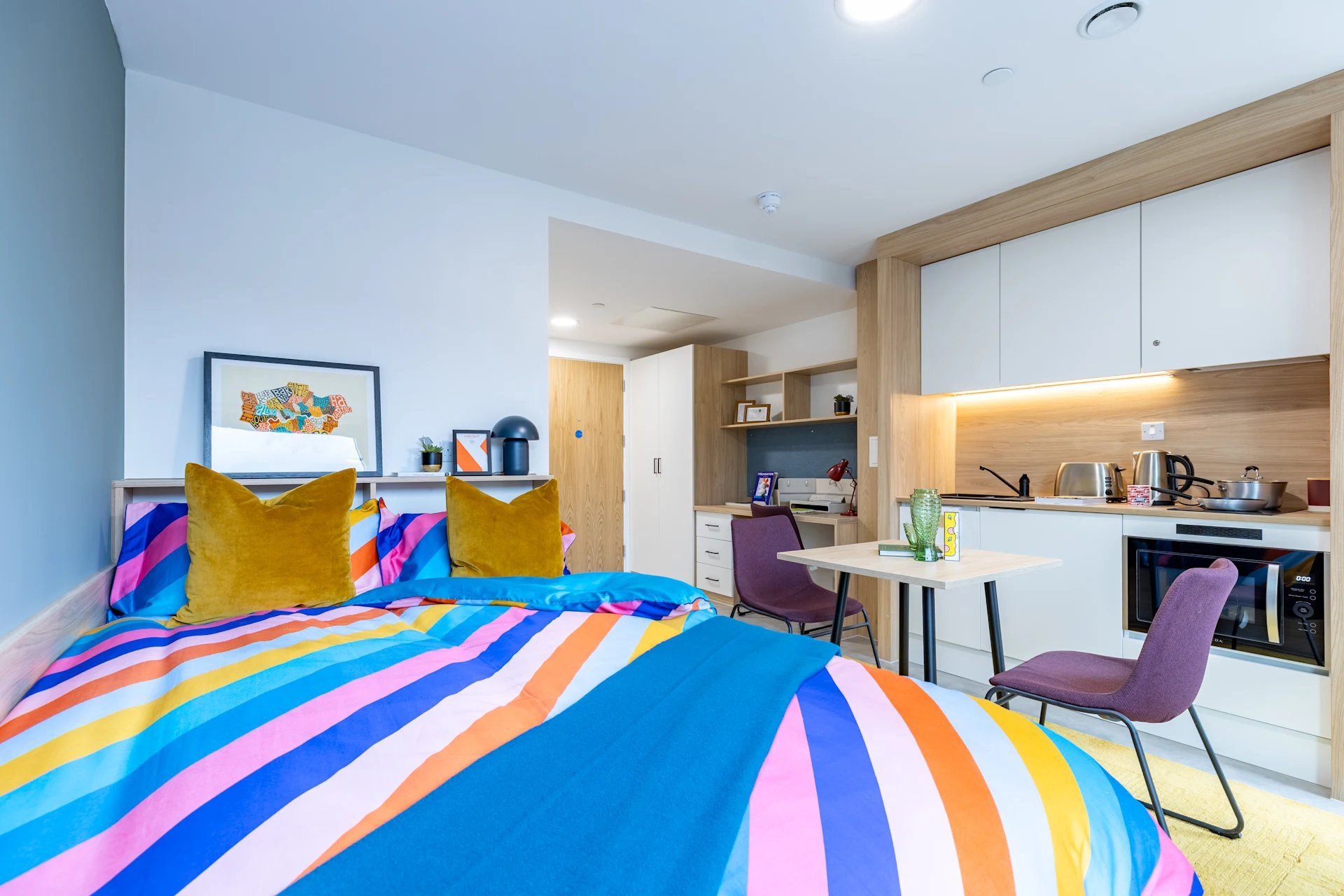 Bed kitchen study area and desk bedroom at Venti House in London Student Accommodation