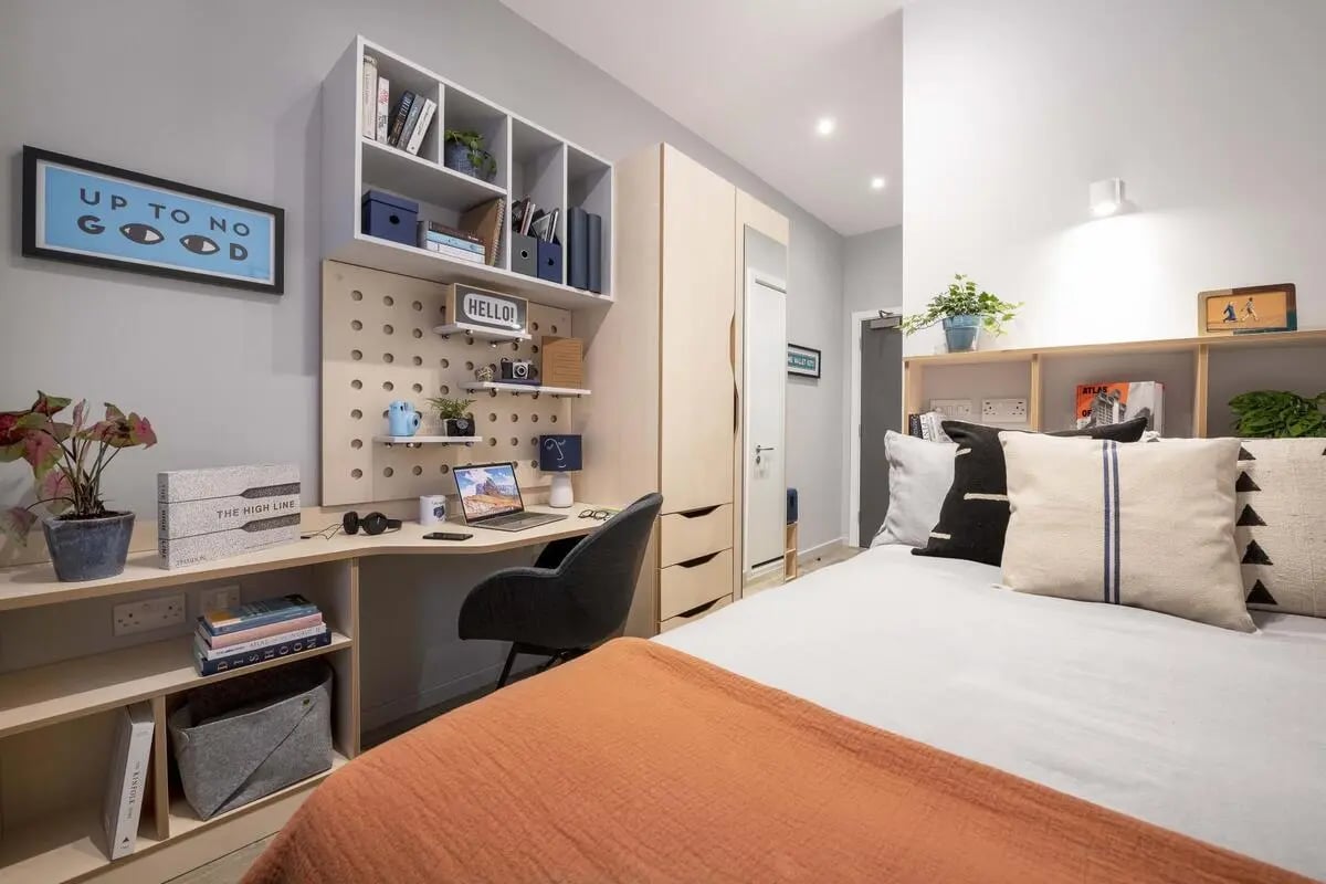 Desk wardrobe bed and shelves student bedroom at Hillside House Sheffield in Sheffield Student Accommodation