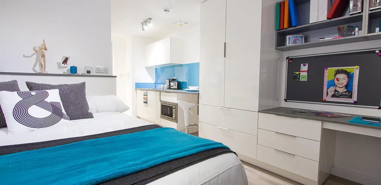 Bed desk kitchenette and closet student studio at The Recording Rooms in Birmingham Student Accommodation