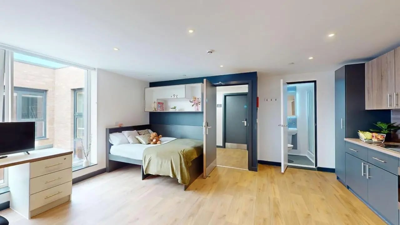 Bed kitchen and bathroom student studio at Innovo House in Liverpool Student Accommodation
