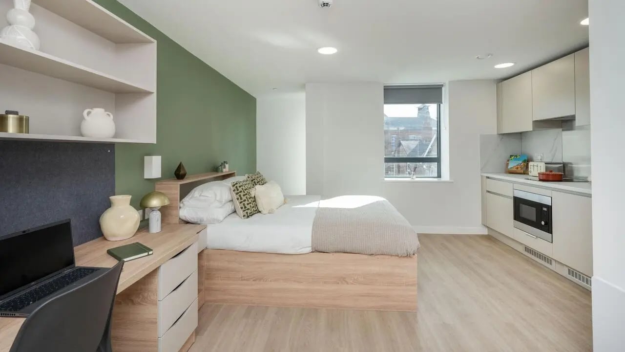 Bed desk kitchen modern studio apartment at Waterloo House in York Student Accommodation