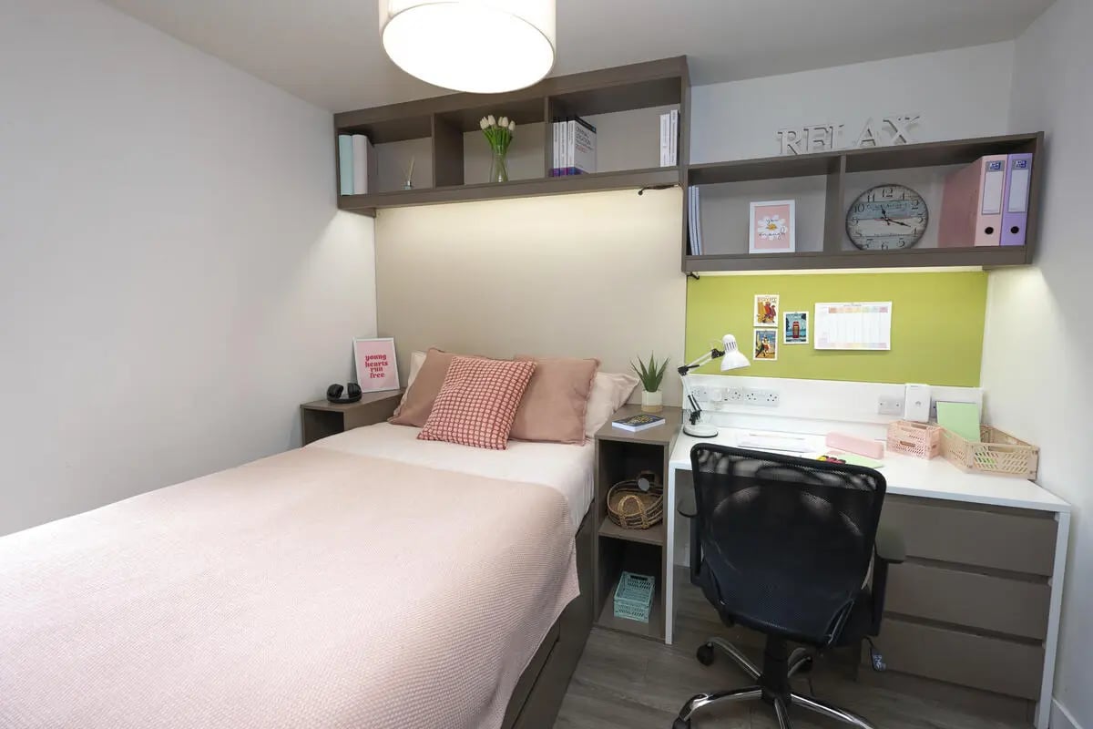 Bed desk shelves and chair student bedroom at Aparto Arbury Court in Kingston Upon Thames Student Accommodation