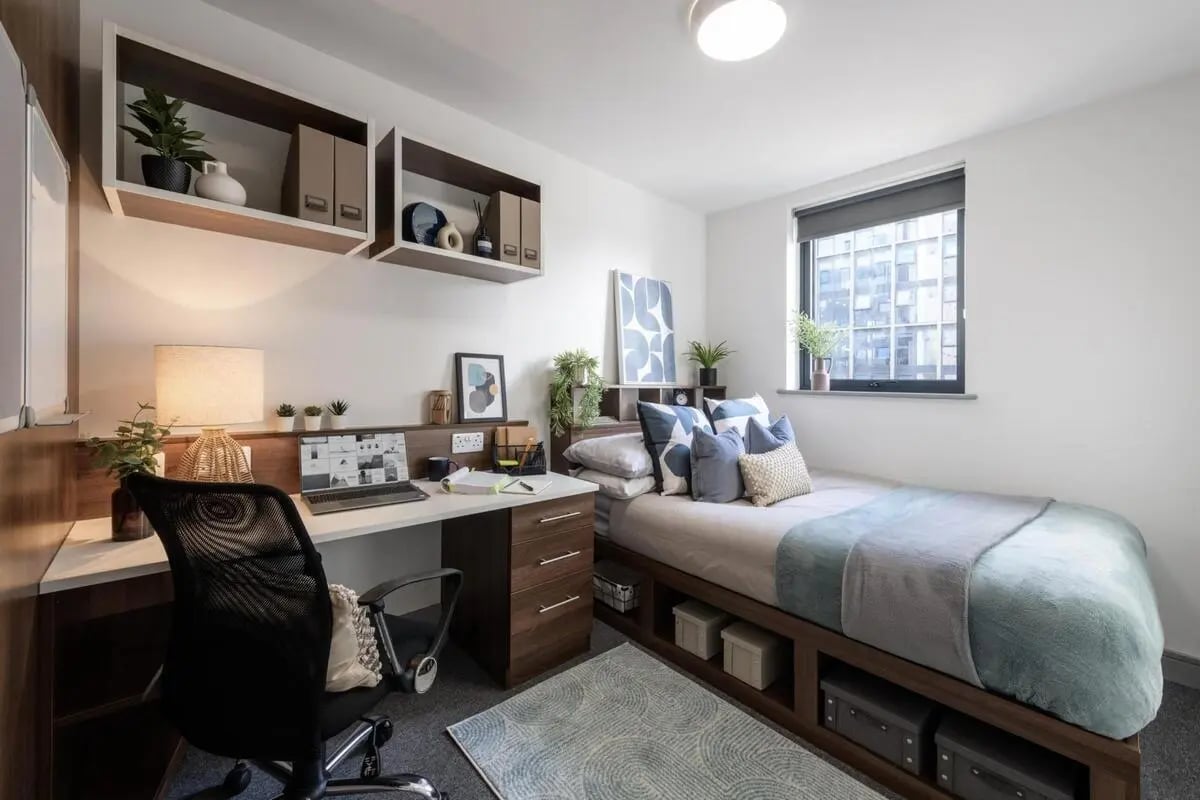 Desk laptop bed shelves rug bedroom at The Foundry in Leeds Student Accommodation