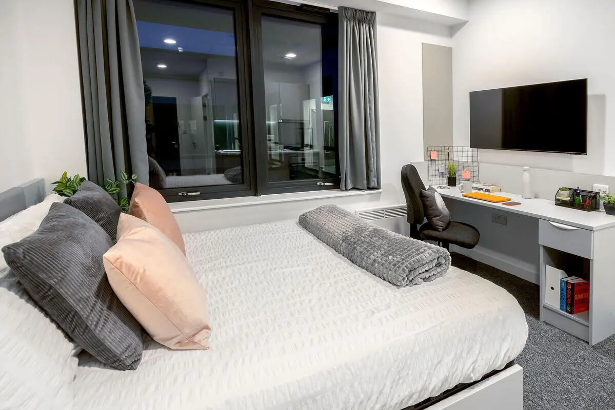 Bed desk TV and chair bedroom at True Leicester in Leicester Student Accommodation