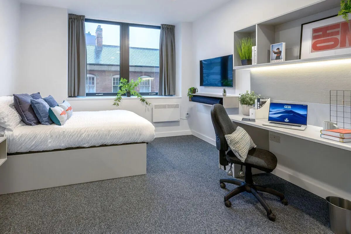 Bed desk chair and television Bedroom at True Leicester in Leicester Student Accommodation