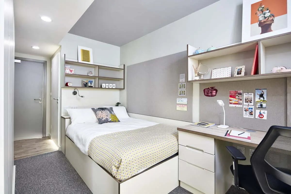 Bed desk shelves and door bedroom at LIV Student Sheffield in Sheffield Student Accommodation