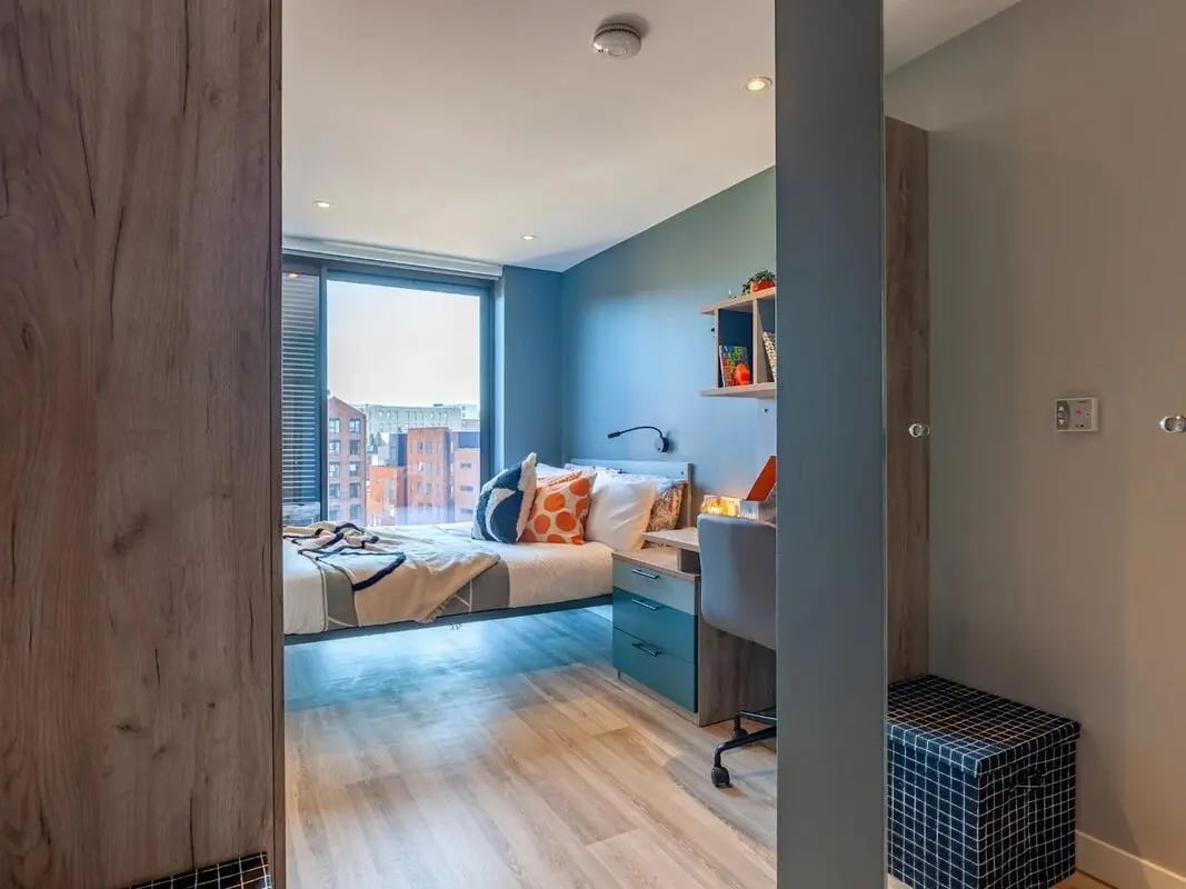 Bed desk chair and storage unit bedroom at Benson Yard in Liverpool Student Accommodation