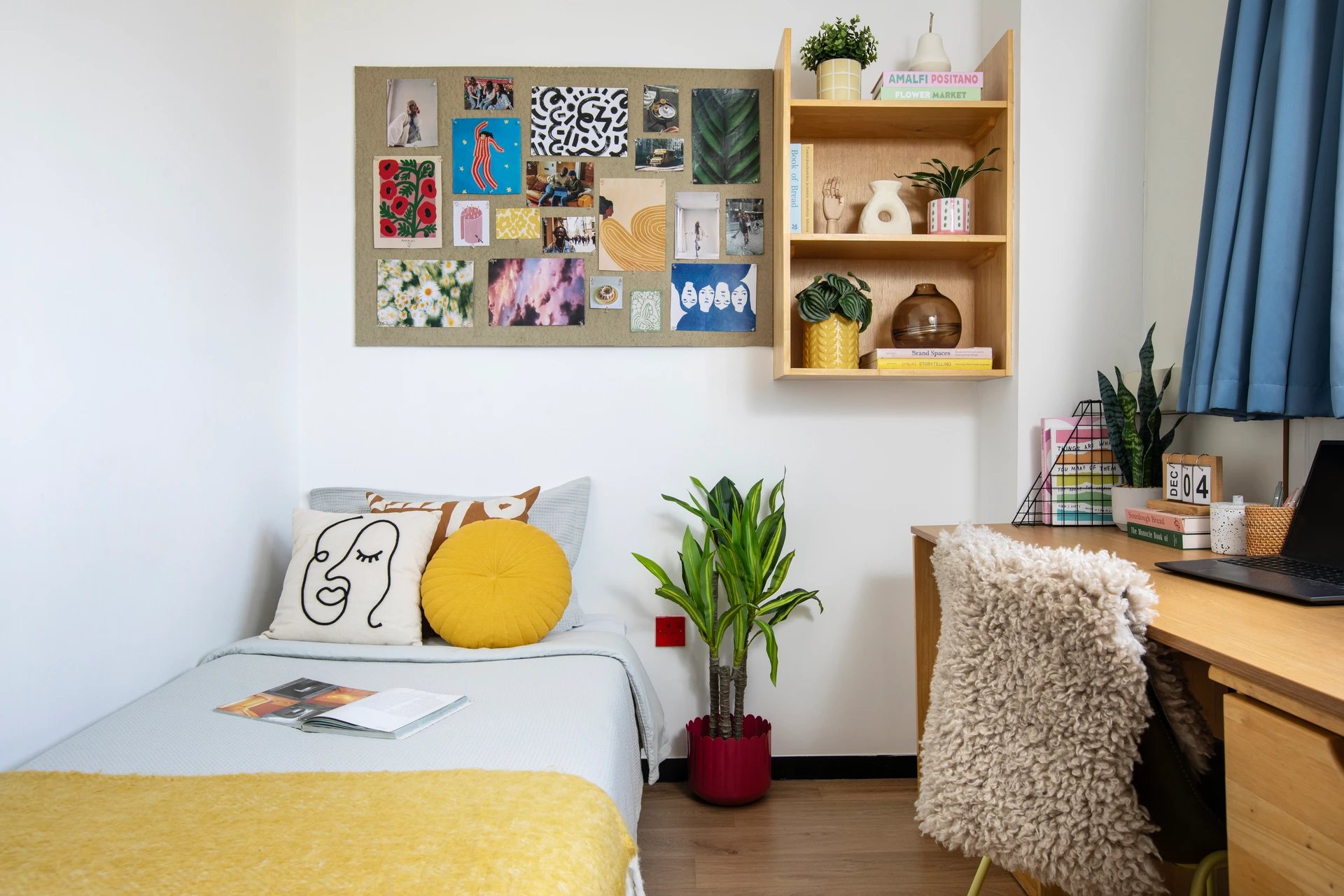 Bed desk and shelf with decorations Bedroom at Ewen Henderson Court in London Student Accommodation