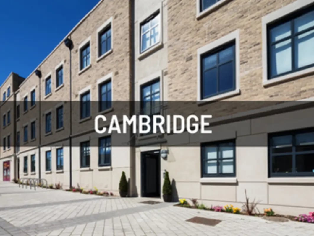Modern brick building facade with many windows exterior at Oxley Residence in Leeds Student Accommodation