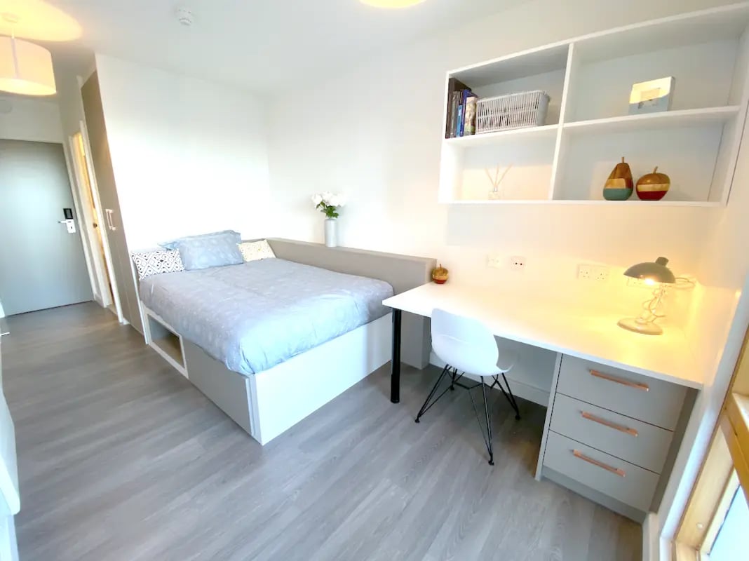 Bed desk shelves and chair bedroom at Charles Morton Court in London Student Accommodation