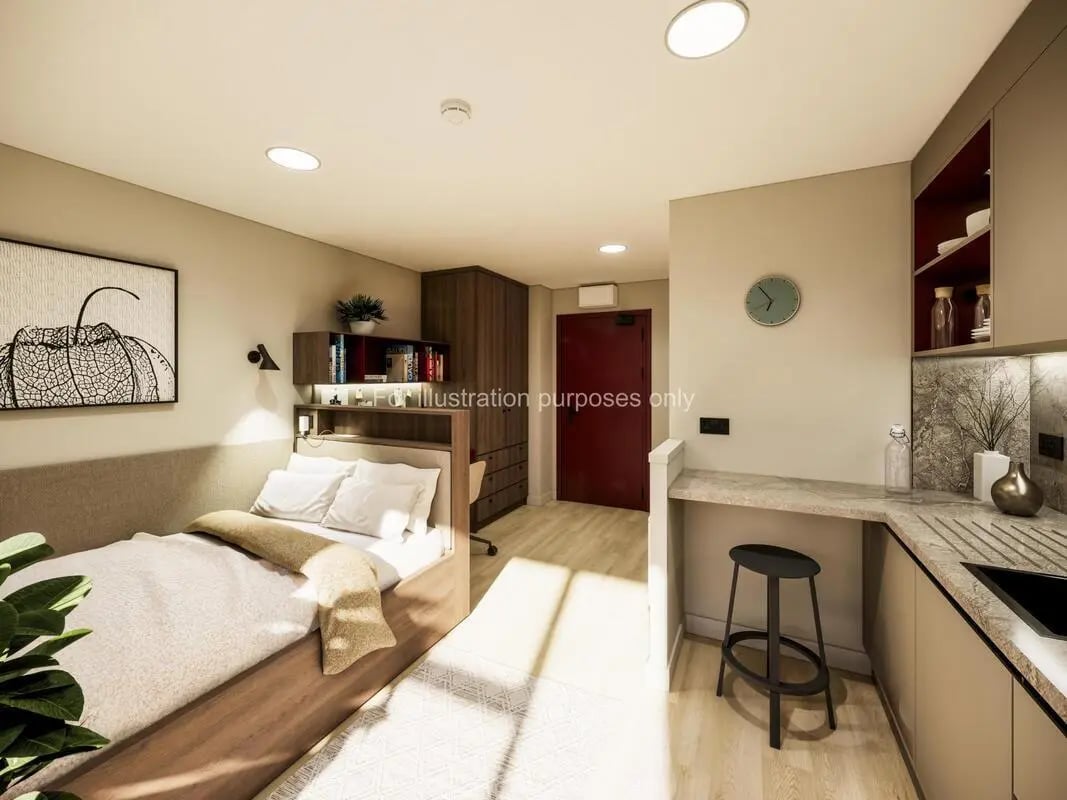 Bed with desk and kitchen area studio at Swan Residences in Glasgow Student Accommodation