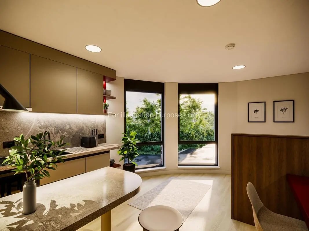 Modern kitchen with island and dining area kitchen at Swan Residences in Glasgow Student Accommodation