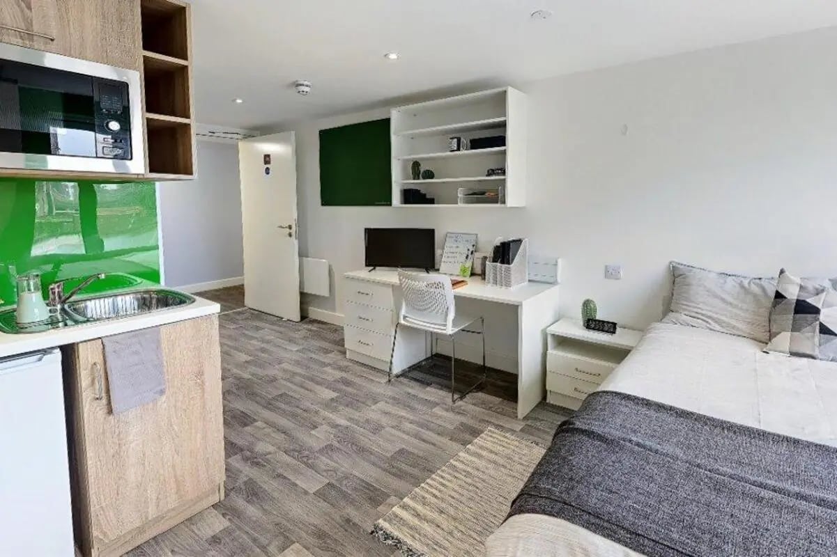 Studio apartment with kitchen desk bed Studio Apartment at The Cube Greenwich in London Student Accommodation