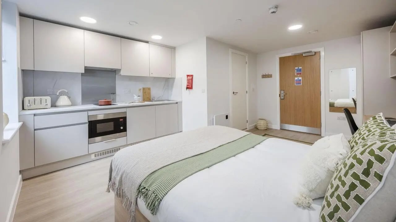 Bed kitchen microwave kettle toaster study area bedroom at Waterloo House in York Student Accommodation