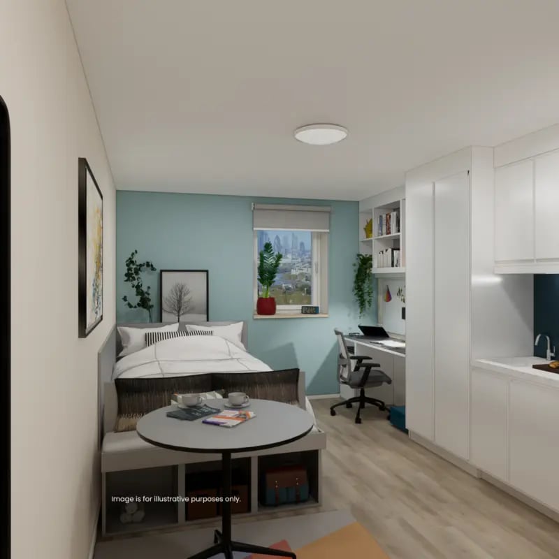 Bed desk kitchen and window studio apartment at Mcmillan student Village in Greenwich Student Accommodation