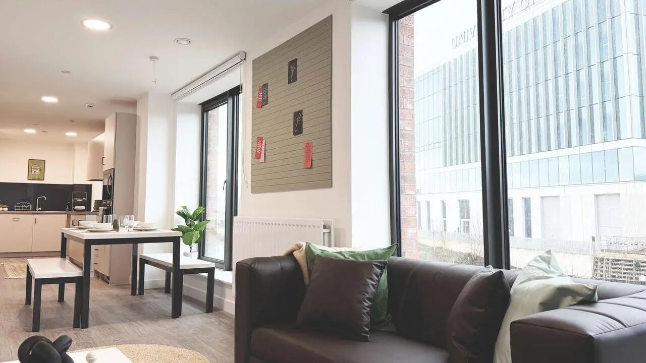 Dining table kitchen sofa couch living room at Waterside in Bristol Student Accommodation