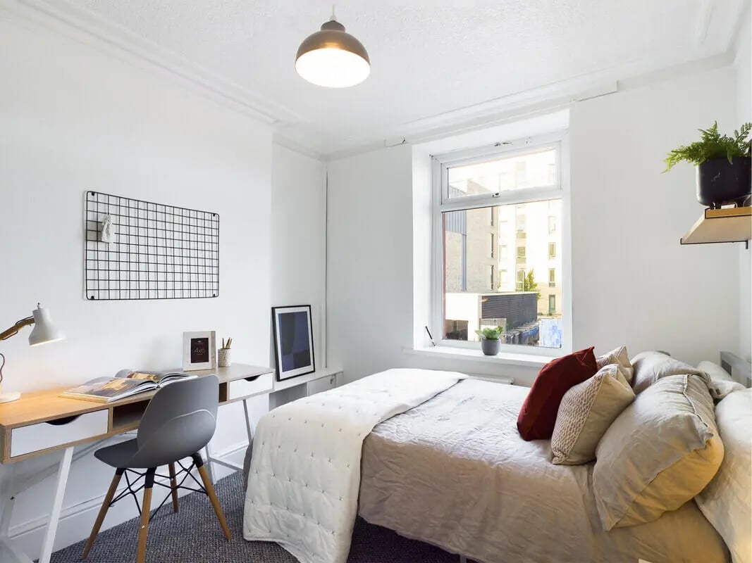 Desk chair bed window plant bedroom study area at 5 Bedroom House at 31, Gladstone Terrace in Lancaster Student Accommodation