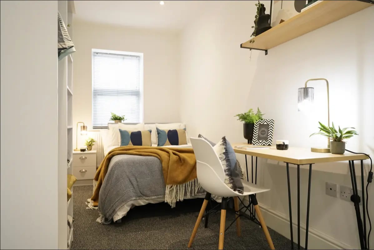 Bed desk lamp and chair bedroom at 6 Bedroom House at 1, Baggholme Road in Lincoln Student Accommodation