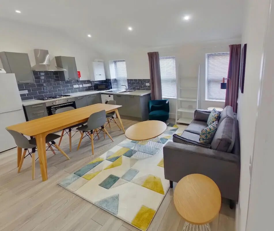 Kitchen dining area with sofa living room at 2 Bedroom House at 20 B, Portland Street in Lincoln Student Accommodation