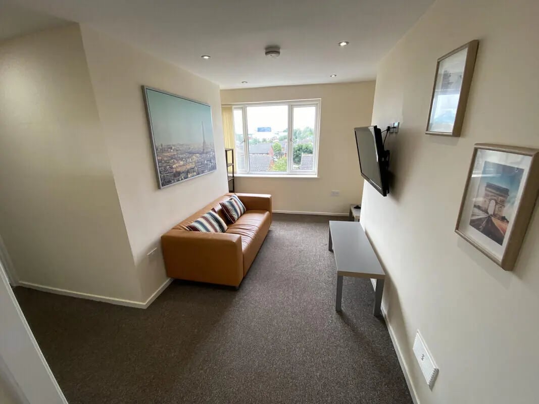 Sofa television grey bench framed art living room at 3 Bedroom House at 94, Minster Court in Liverpool Student Accommodation